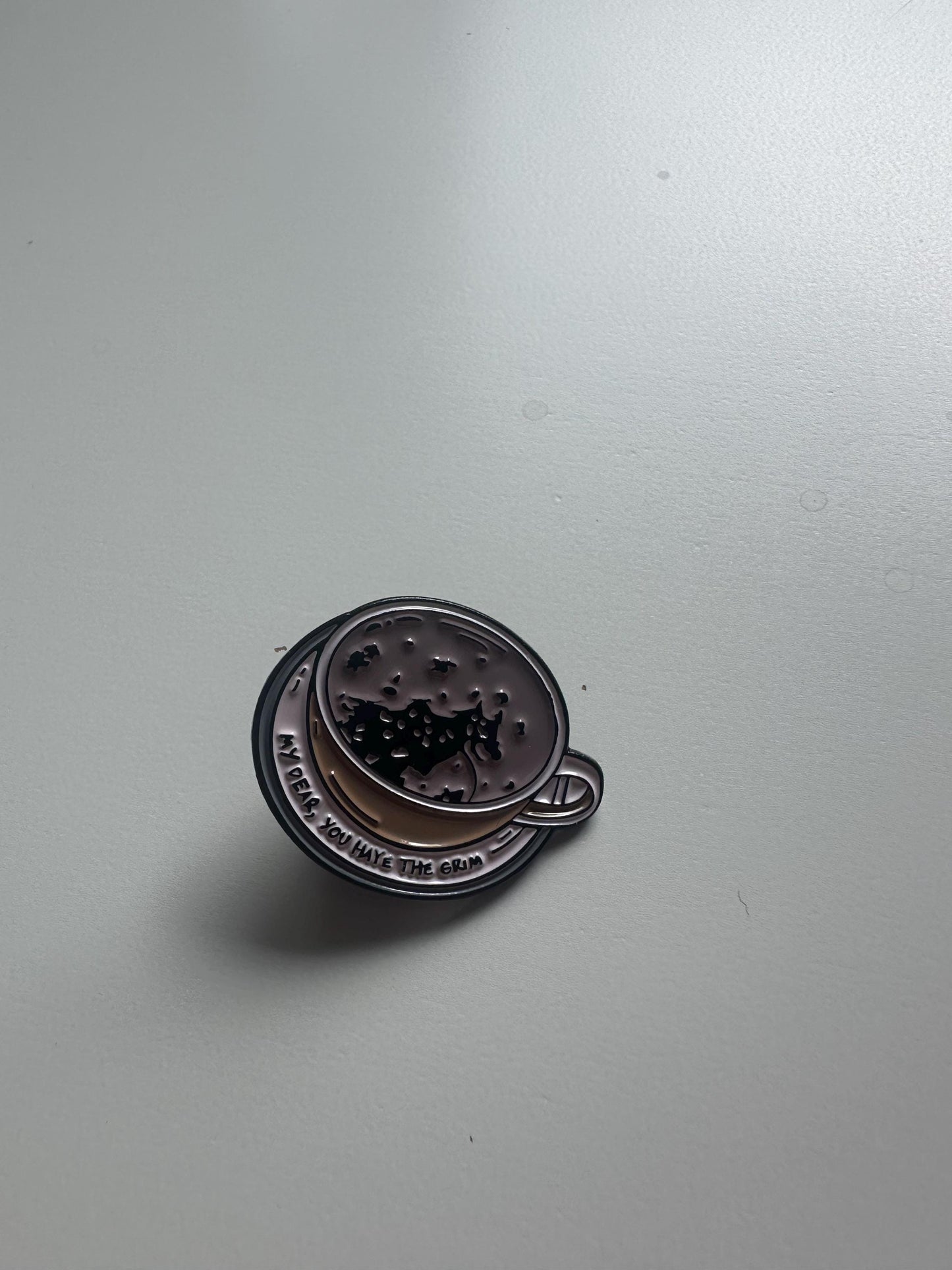Wizarding pins - flying/winged key, train ticket, post stamp, grim teacup