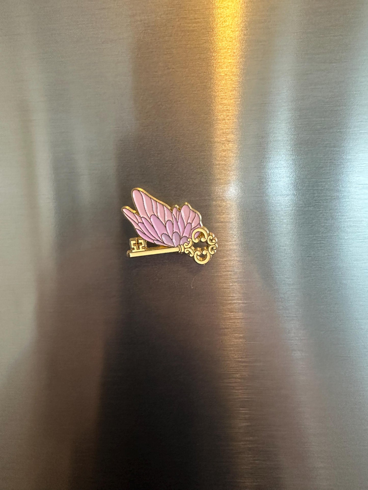 Wizarding pins - flying/winged key, train ticket, post stamp, grim teacup